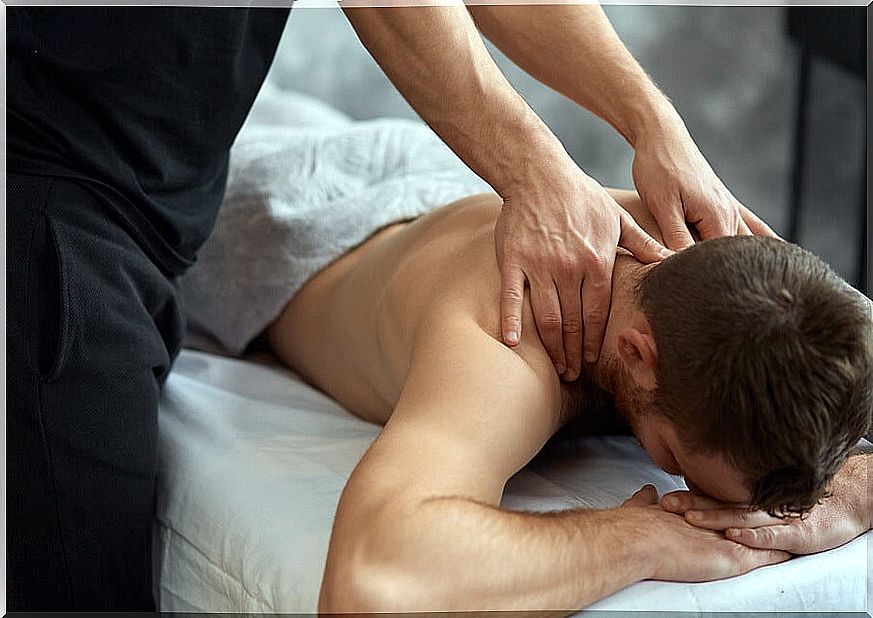 Man receiving one of a kind of therapeutic massage